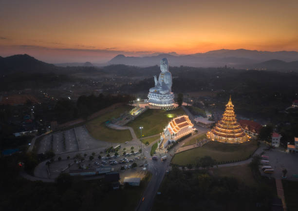 Wat Huay Pla Kang is a temple complex containing a withe big Buddha statue and 9 floor pagoda and a beautiful white temple in Chiangrai, Thailand.