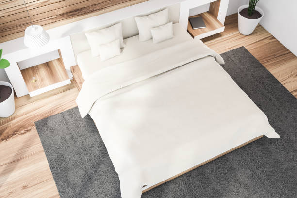 istock White and wooden master bedroom, top view 1263312695