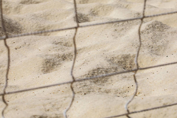 istock background sand beach volleyball mesh sunny bright day texture 1263315327