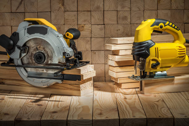 istock construction carpentry tools electric corded circular saw and jigsaw on wooden background 1263325780