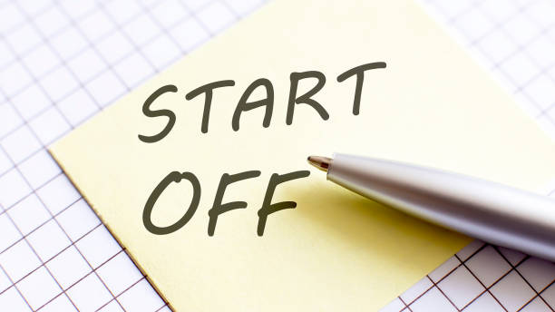 istock yellow paper with text START OFF on the white background 1263327903