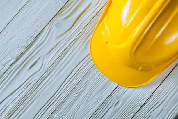 istock construction helmet on vintage white wooden painted boards close up 1263338402