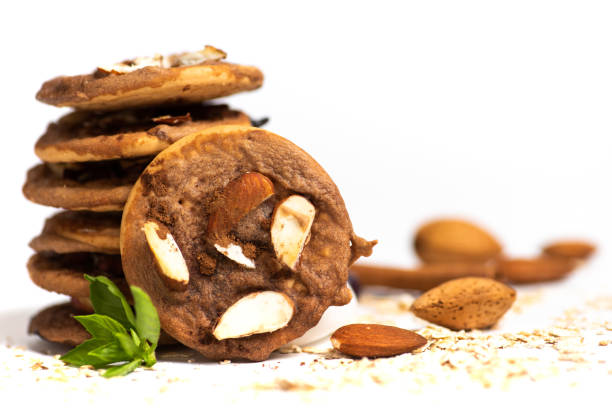 istock Integral cookies with almonds on white isolated 1263341548