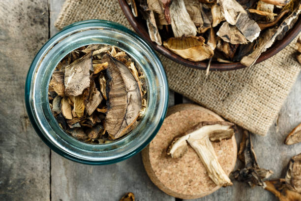istock Dried porcini mushrooms in a storage jar. 1263344066