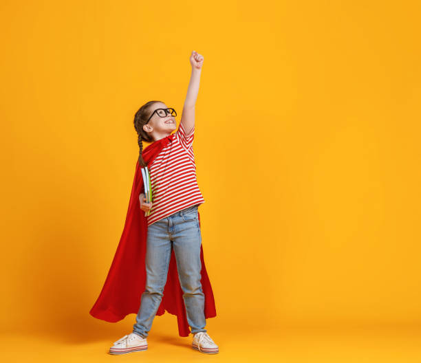 istock Little superhero studying at school 1263344374