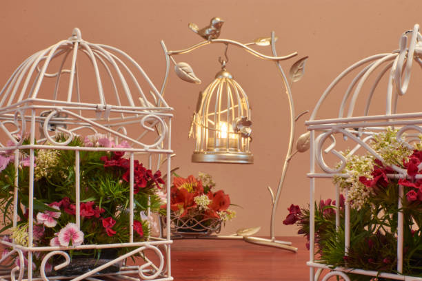 istock Bird cage flower arrangement vintage wedding decorations 1263350792