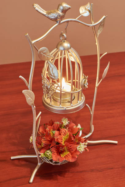 istock Bird cage flower arrangement vintage wedding decorations 1263350876