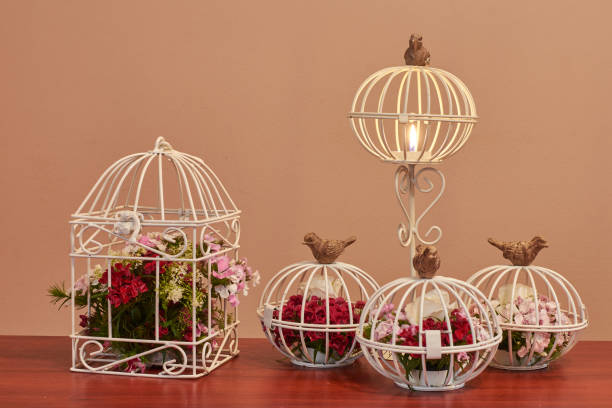 istock Bird cage flower arrangement vintage wedding decorations 1263350882