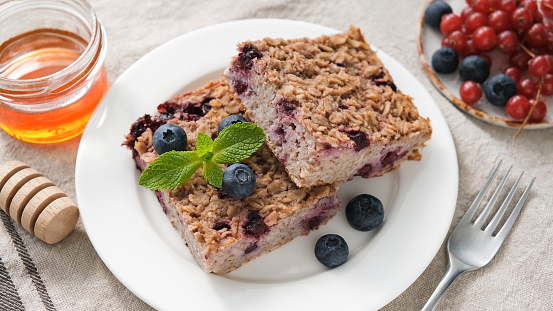 Baked oatmeal bars with blueberry. Vegetarian baked oatmeal pie