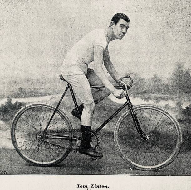 istock Cyclist Tom Linton, sitting on his racing bicycle, on the road 1263355307