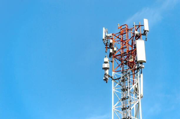 istock closeup telecommunications tower on blue sky with soft-focus and over light in the background 1263357168