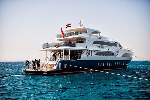 Monte Carlo, Monaco - September 20, 2015: White ship and group of scuba divers, Hurghada, Egypt