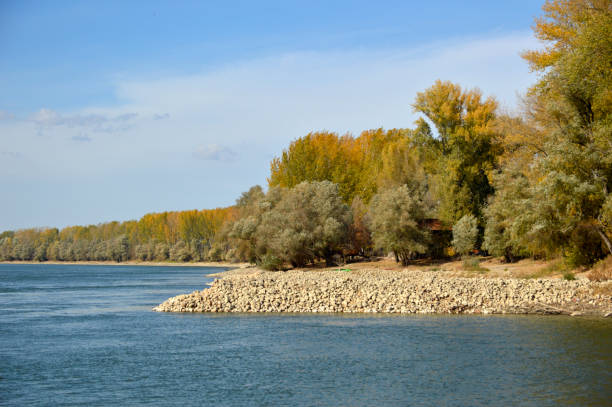 landscape by the Danube river in bright autumn day