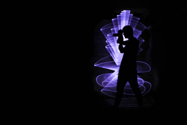istock Silhouette of a man photographing. 1263359934