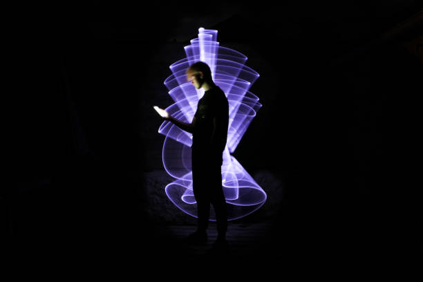 istock Silhouette of a man using a smartphone. 1263359993