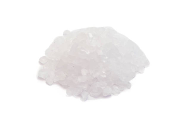 istock Sea salt isolated on white background 1263367498