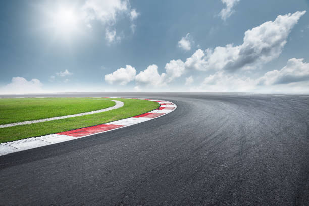 Race Track Dramatic view of racing asphalt road. auto racing photos stock pictures, royalty-free photos & images