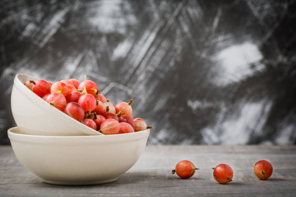 still life photography with fresh red gooseberry