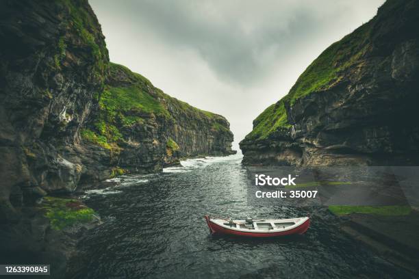 Natural Harbor In Gjógv Faroe Islands Stock Photo - Download Image Now - Faroe Islands, Cliff, Nautical Vessel