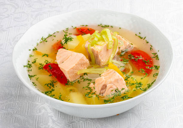 istock Soup with salmon and vegetables. On white background 1263399494