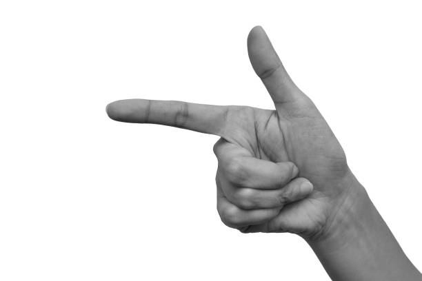 istock Woman's hand pointing to something isolated on white background. Hand language concept. Communication concept. Black and white tone. 1263404215