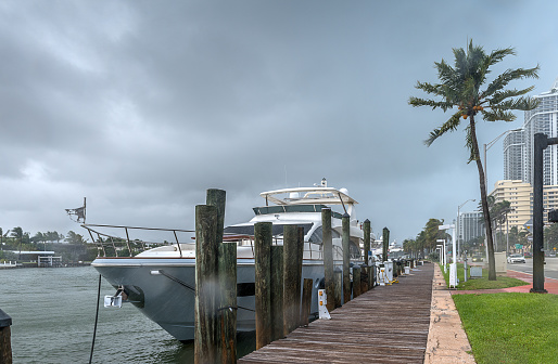 Hurricane season in full activity with torrential rain and strong winds in a Miami Beach marina.