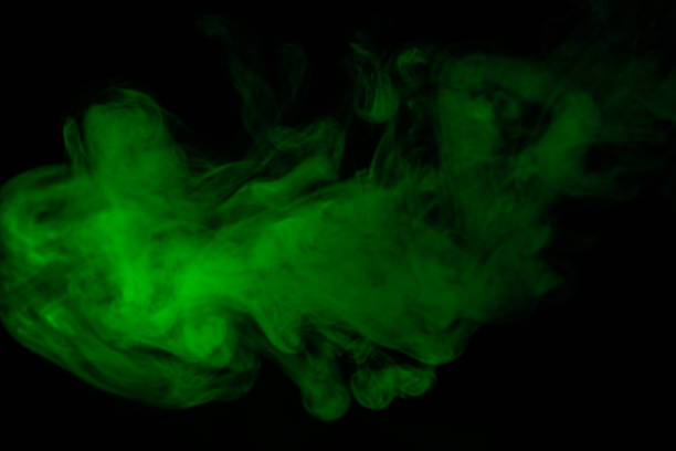 istock Green steam on a black background. 1263405246