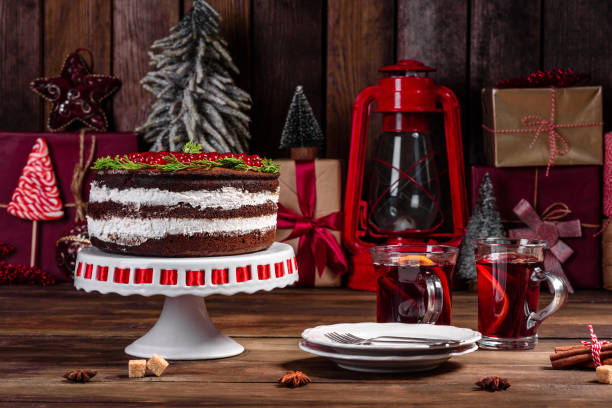 istock Beautiful delicious cake with bright red berries on the Christmas table 1263405316