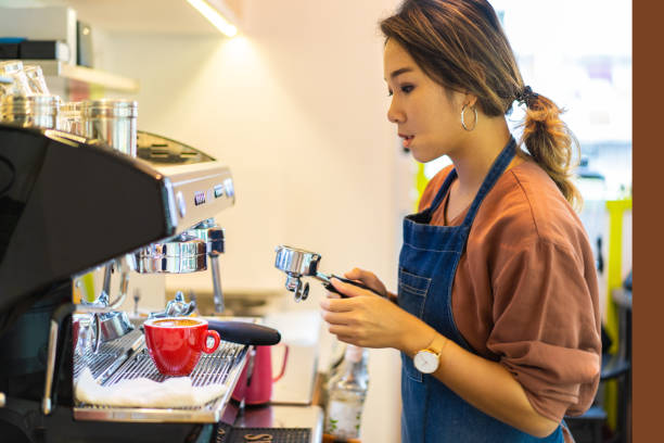 istock Asian female barista making cappuccino 1263405877