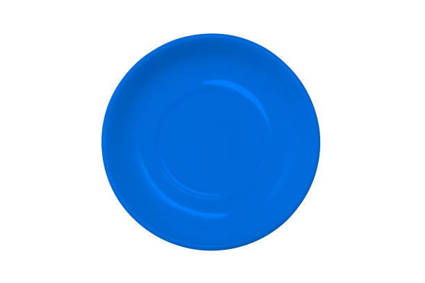 istock Plate isolated on a white background. Blue empty food plate. A top view of a flat layout. 1263412858