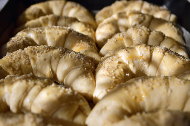 istock unbaked rolls with sesame seeds 1263417715
