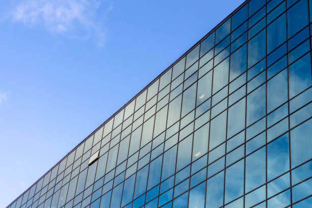 istock Modern office building and sky with clouds 1263417858