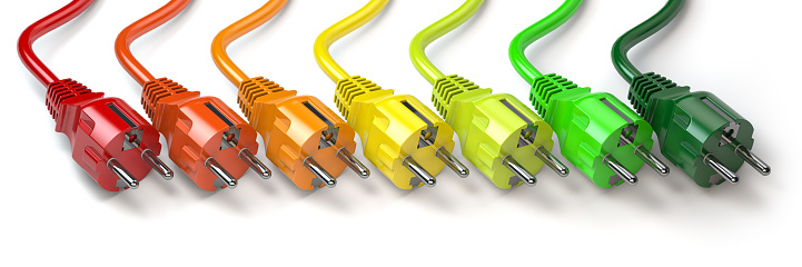 Energy consumption concept. Clolored electric  plugs in colors of energy classification labels. 3d illustration