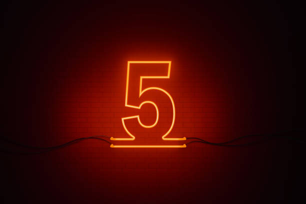 istock Number Five Written by Red Neon Light on Black Wall 1263428545
