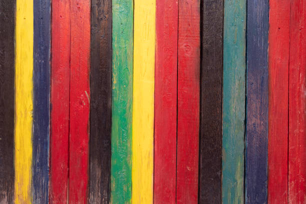 istock background of multi colored rough boards, red, black, yellow, blue, green 1263428566