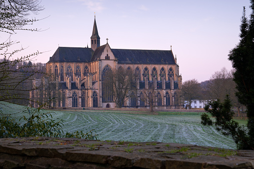 Odenthal, Germany - March 27, 2020: Panoramic image of the Altenberg cathedral in morning light on March 27, 2020 in Germany