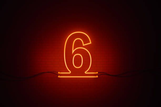 istock Number Six Written by Red Neon Light on Black Wall 1263429276