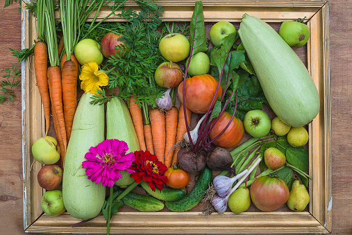 Beautiful picture with fresh vegetables and fruits in frame