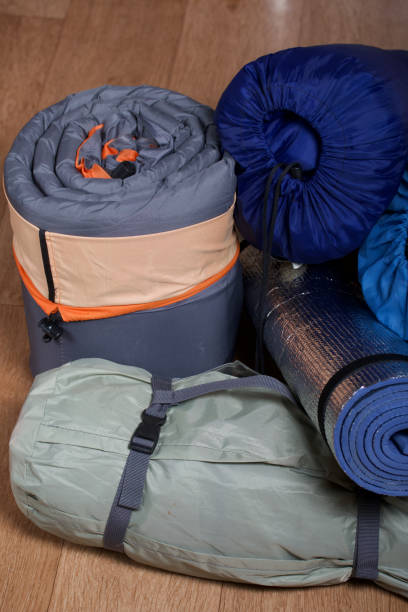 istock Tourist equipment. Self-inflating rugs and tent. 1263429657