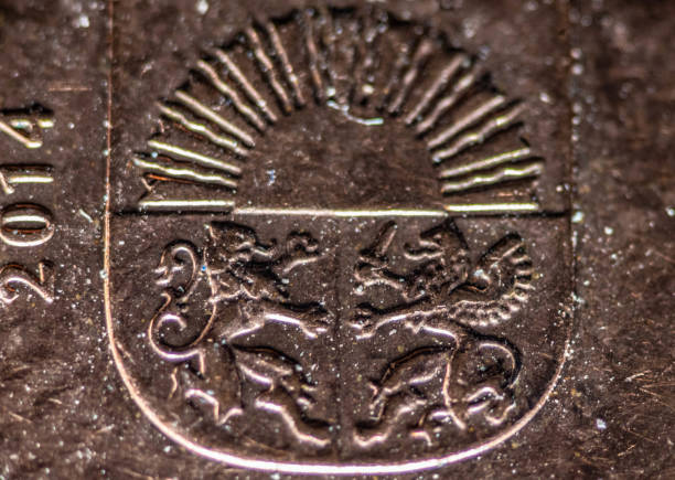 Euro coins and finance data. Selective focus.