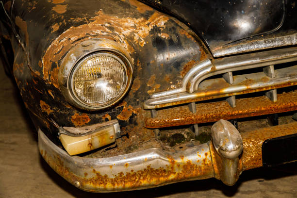 istock old rusty retro car of black color. 1263435567