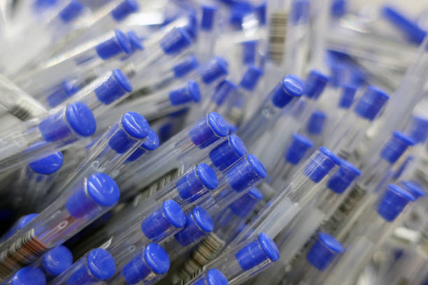 istock clear ballpoint pens with blue caps 1263435718