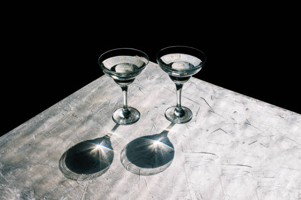 istock Glass glasses with natural shade. Silver and black background. Minimal creative style 1263438900