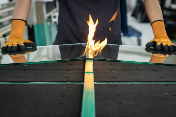 Burning glass in factory, A specialized technique of cutting laminated VSG (Very Safe Glass)  glass The fire burns through the foil connecting the panes,