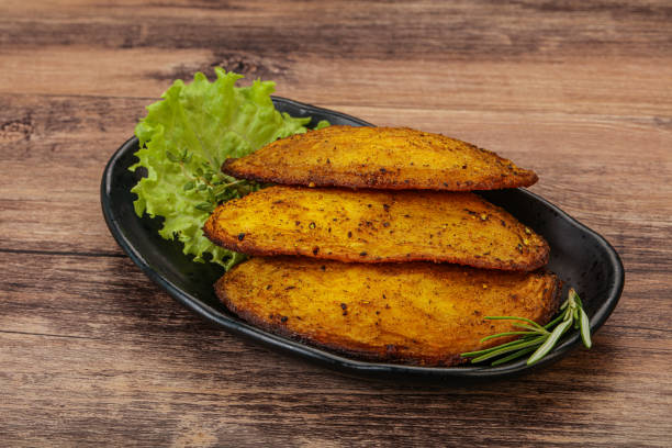 istock Baked potato with herbs and spices 1263442370