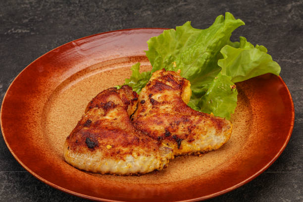 istock Roasted chicken wings with spices 1263442942
