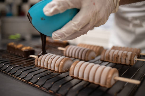 istock Chef pouring hot chocolate on chocolate biscuit 1263447386