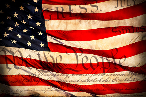 American flag double exposed over USA Declaration of Independence, vignette, dark edges, grunge, retro, history, old, worn, historic document freedom, independence, liberty