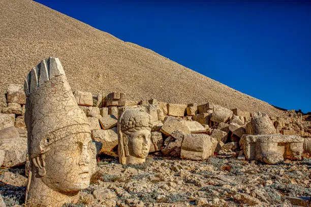 Antique statues on Nemrut mountain, Turkey. The UNESCO World Heritage Site at Mount Nemrut where King Antiochus of Commagene is reputedly entombed.