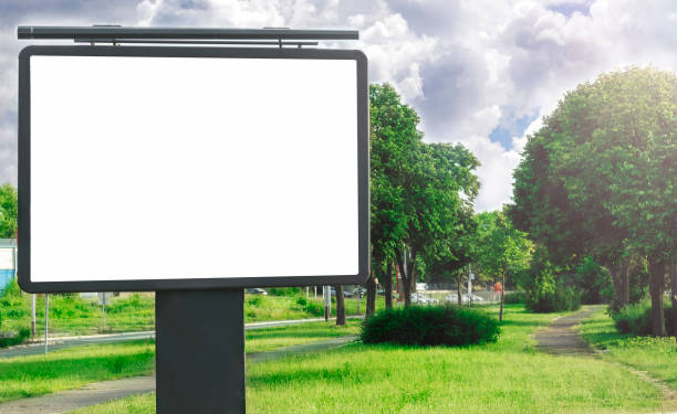 istock Blank billboard on road in city useful for advertising, mock up 1263449392